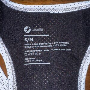 NWOT Oiselle Reflective Tank Top/coral & silver color with circle pattern